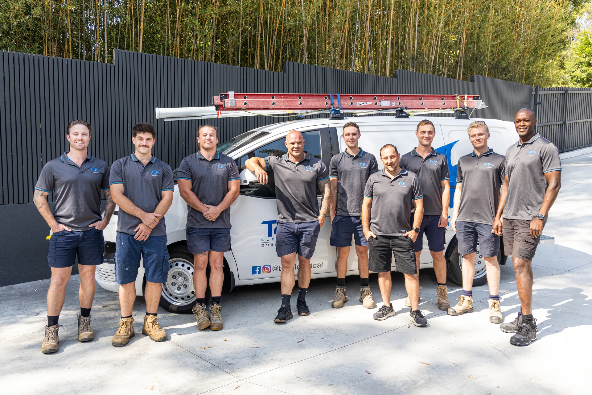 The Air Conditioning Upper Coomera team with a service van